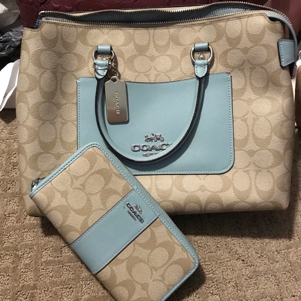 SOLD Coach bag ad wallet. Color light blue with Coach canvas